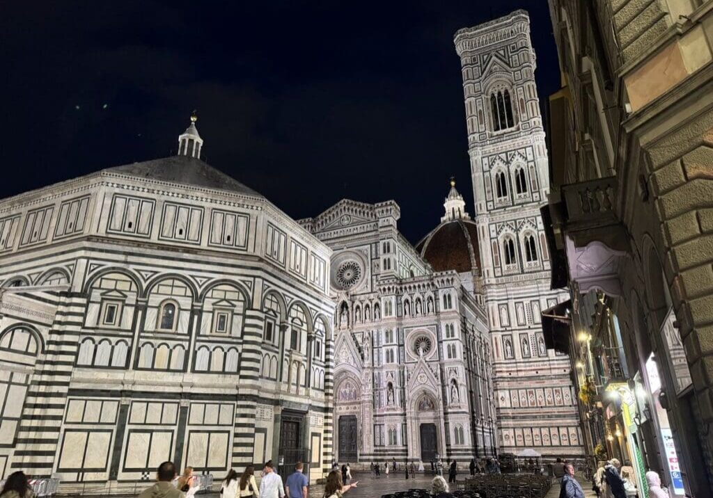 Tropical beach with palm trees and clear water.